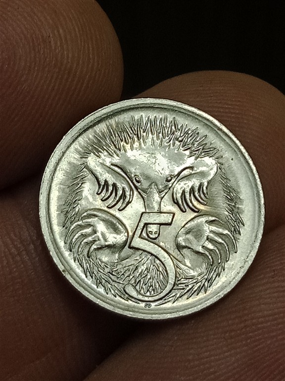 Strange-Radiating-Lines-On-1988-5-Cents